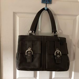 Brown coach leather purse.